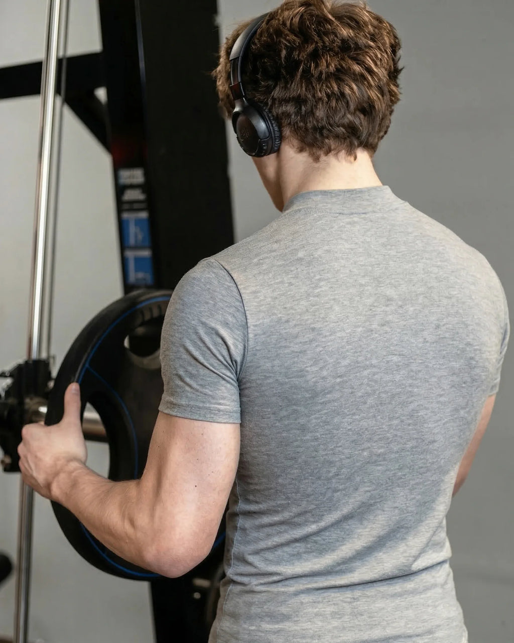 Back of grey muscle fit tee